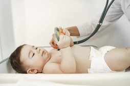 doctor-with-stethoscope-baby-without-clothes-examination-by-doctor-1